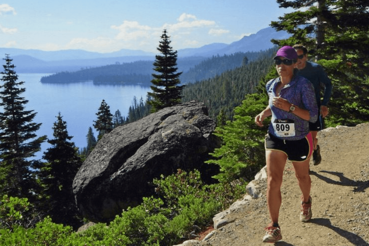 Debbie North and her husband run a race by Lake Tahoe